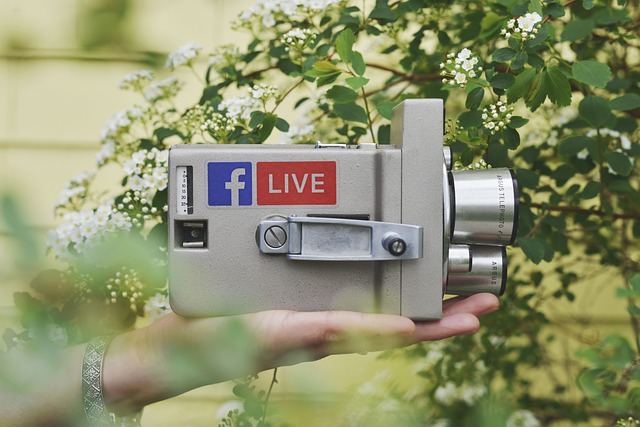 Vintage camera with Facebook Live logo, SociShare, Social Media Management