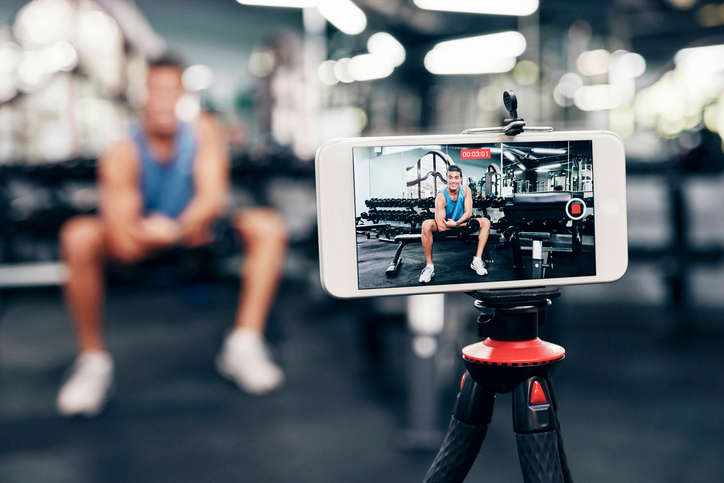 Recording fitness vlog at gym using smartphone, SociShare, Social Media Management