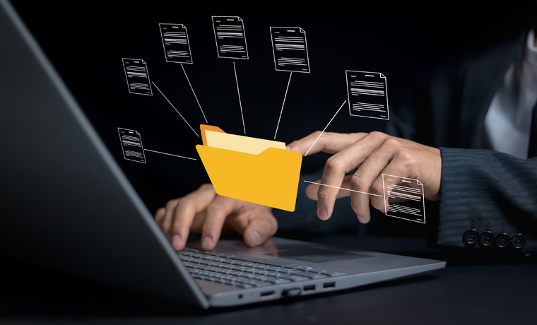 Digital file management on laptop screen, SociShare, Social Media Management