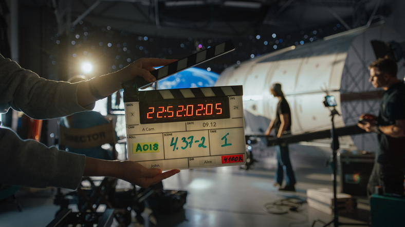 Film set with clapperboard and crew, SociShare, Social Media Management